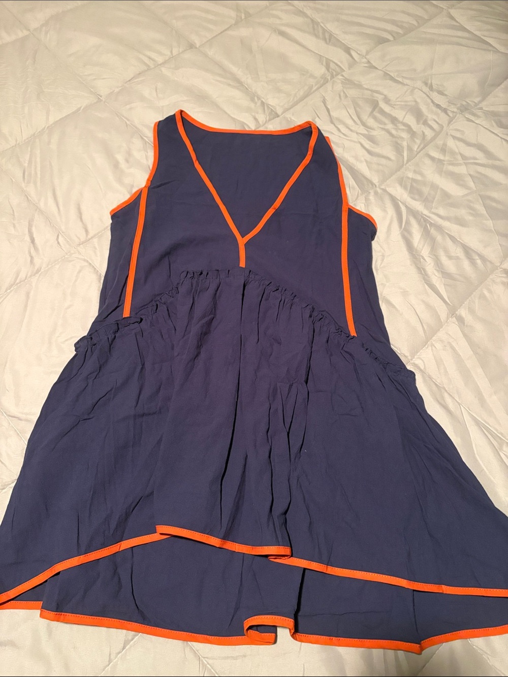 A Classy Chic Boutique Navy Mini Dress with Orange Trim